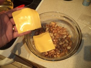 Figura 16 - Mais uma camada de queijo processado.